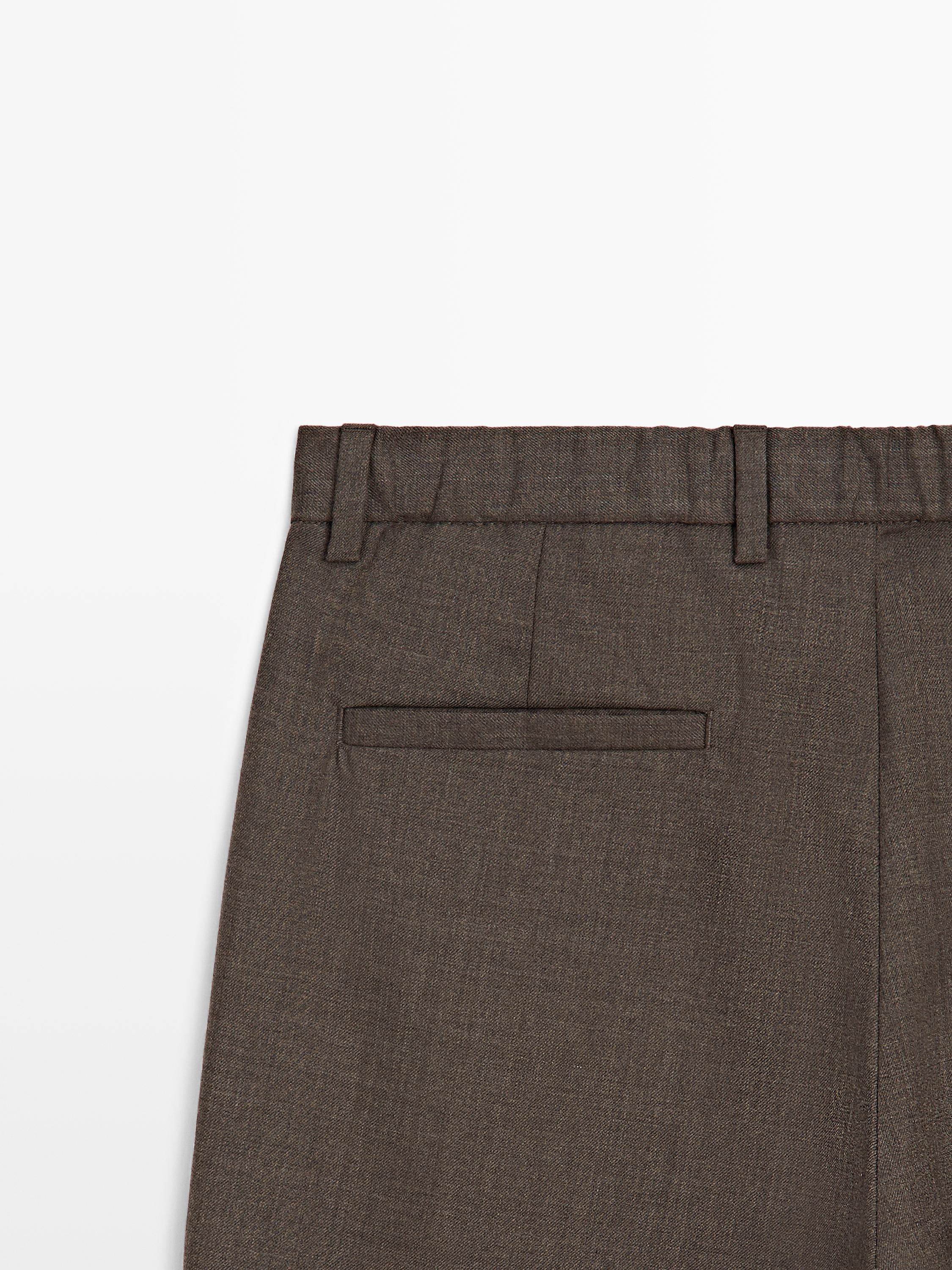 Pantalon à pinces en laine